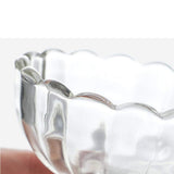 Stylish glass bowls for serving ice cream, salads, and fruits, available in a 6-piece set.